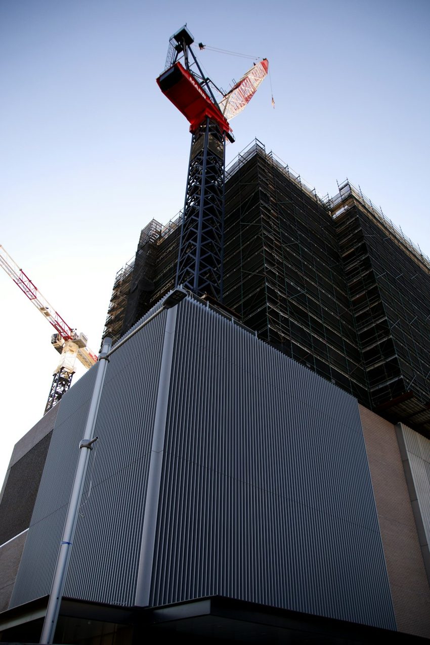 Construction crane and a building under development in Redfern, Sydney.